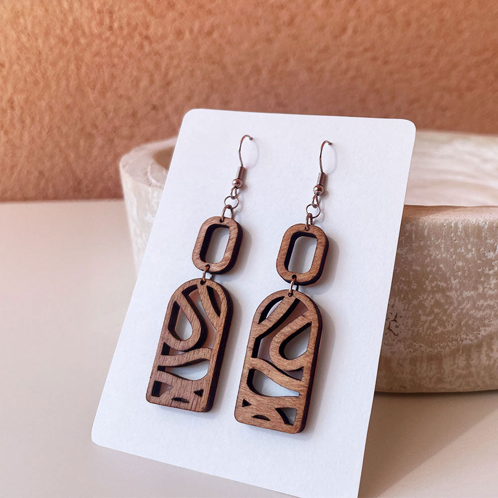 Paire de boucles d’oreilles en bois fait-main Cala Esmeralda, création artisanale Paola Mallorca
